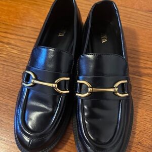 Black Loafers with Gold Buckle